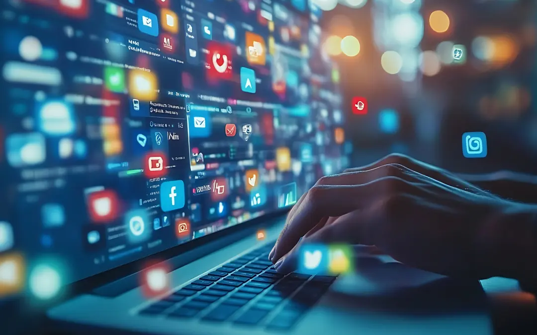 Color photo illustration of fingers typing on computer keyboard with web and social media icons floating above.