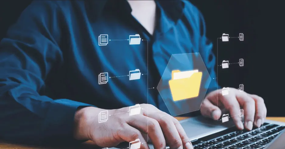 Color illustration of person using computer keyboard with icon of letters floating nearby.