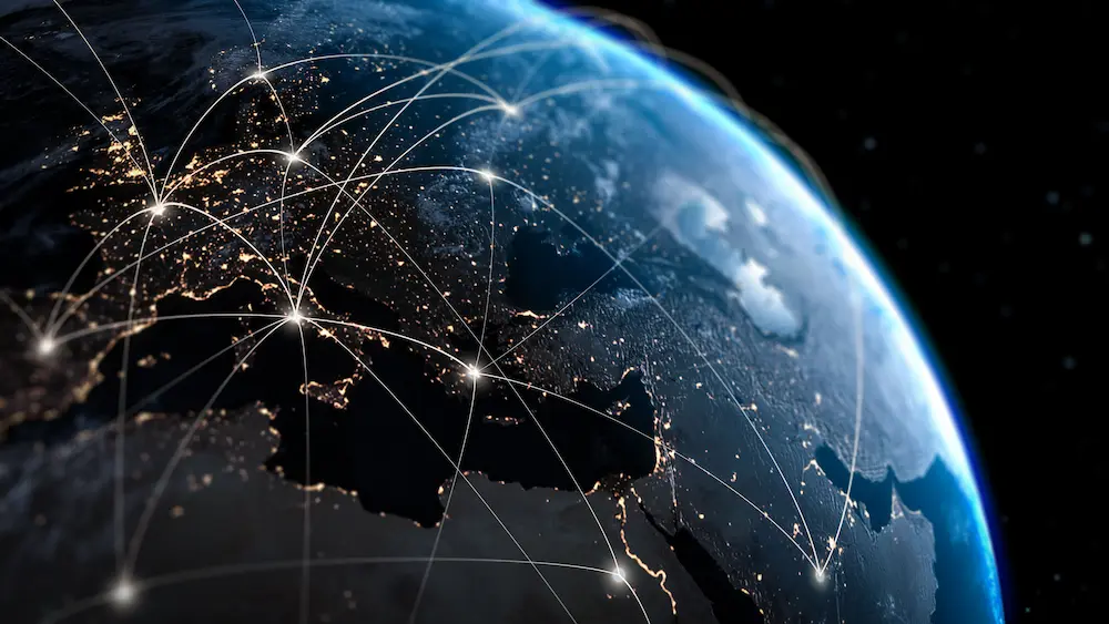 Color illustration of digital net covering the globe.